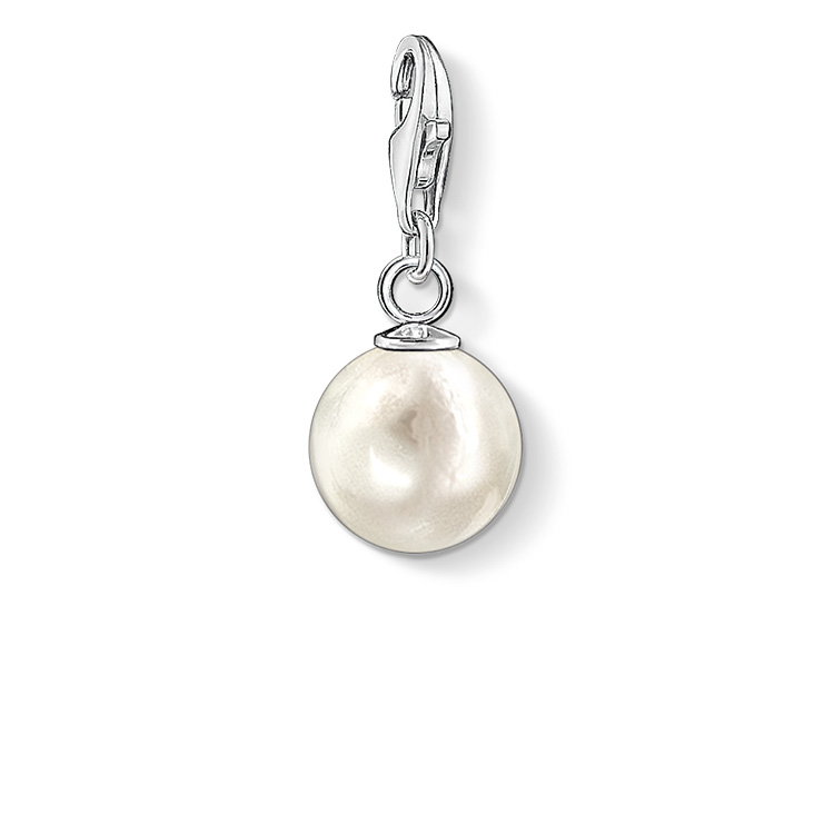 Pearl charm with silver clasp on a white background