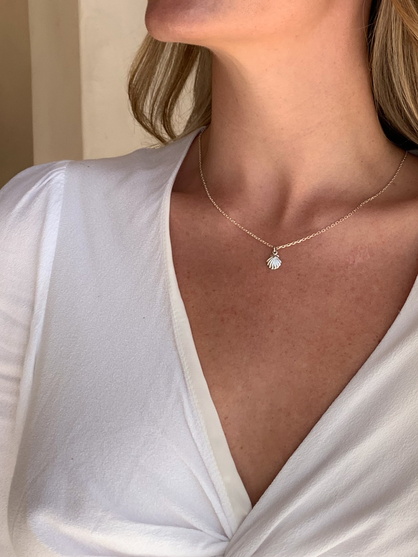 Silver Shell Necklace with white blouse