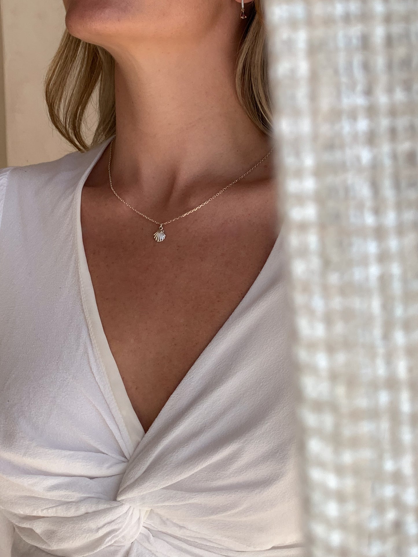 Silver Shell Necklace with white blouse