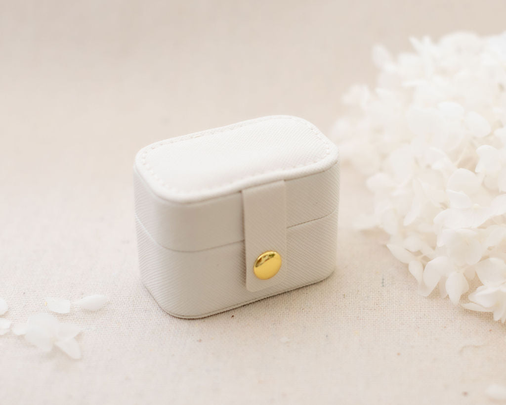 small ring box fits 4 rings button closure closed