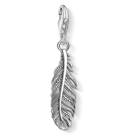 Silver feather pendant charm on a white background