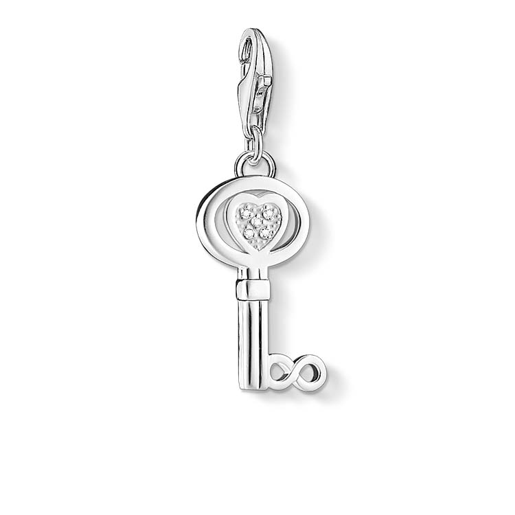 Silver key-shaped charm with a heart cutout on a white background