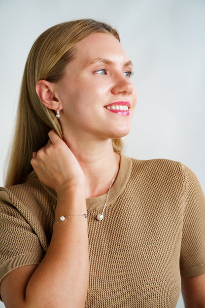 ADAGIO NINE-2-FIVE PEARL OVAL HOOPS SILVER