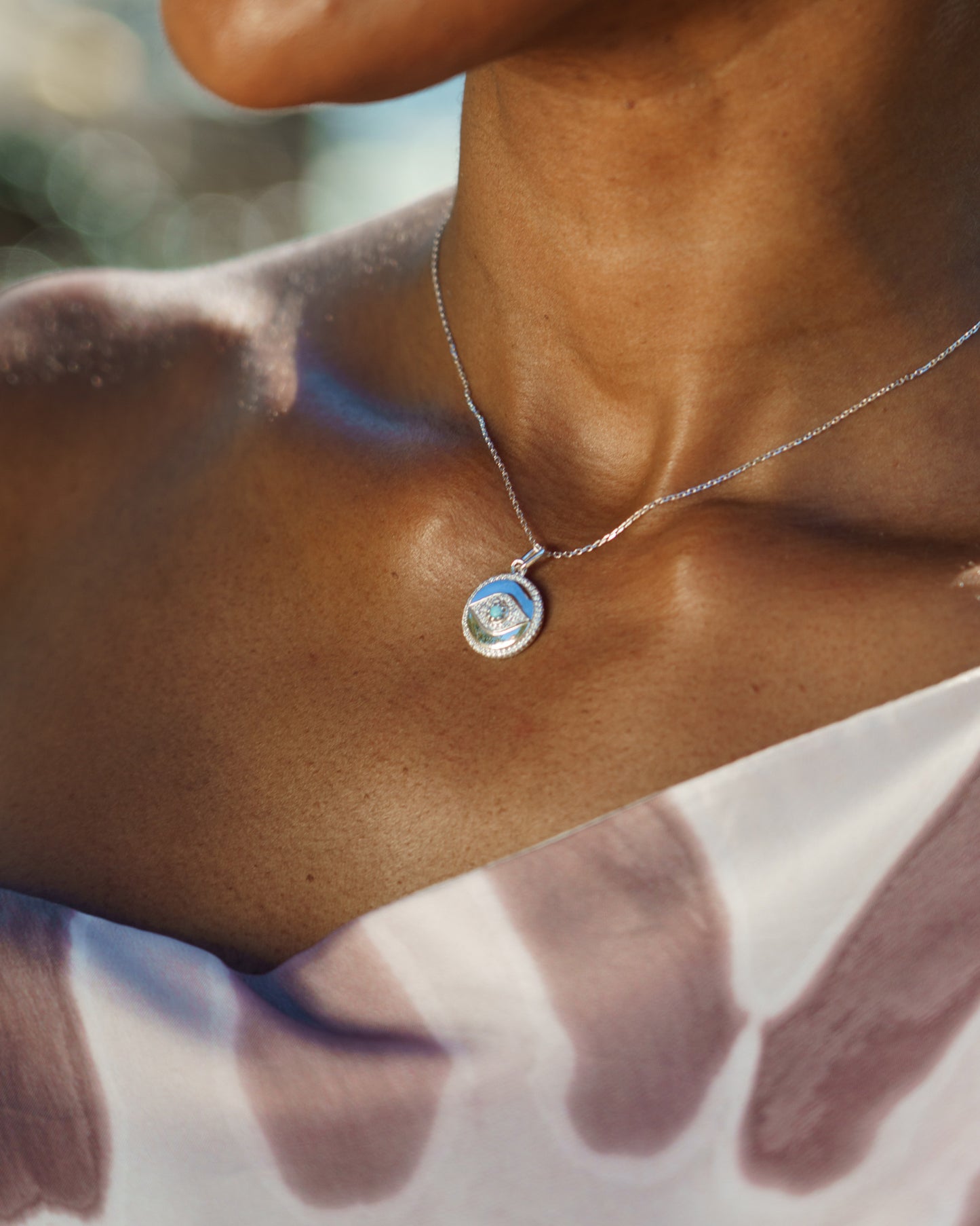 OPAL GLOW BLUE CREATED OPAL EVIL EYE MEDALION SILVER