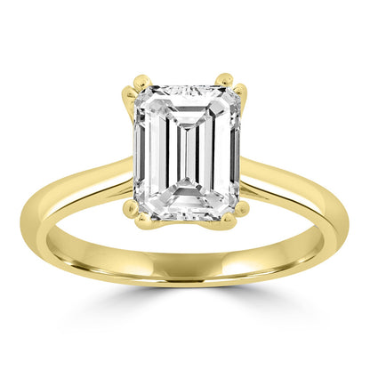 Solitaire Emerald Cut Diamond Engagement ring set in yellow gold