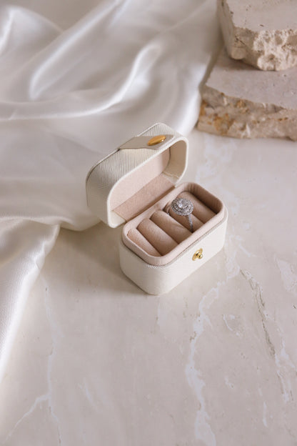 cream mini travel ring box with ring
