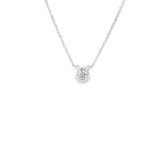 minimalistic diamond solitaire necklace in white gold bezel setting