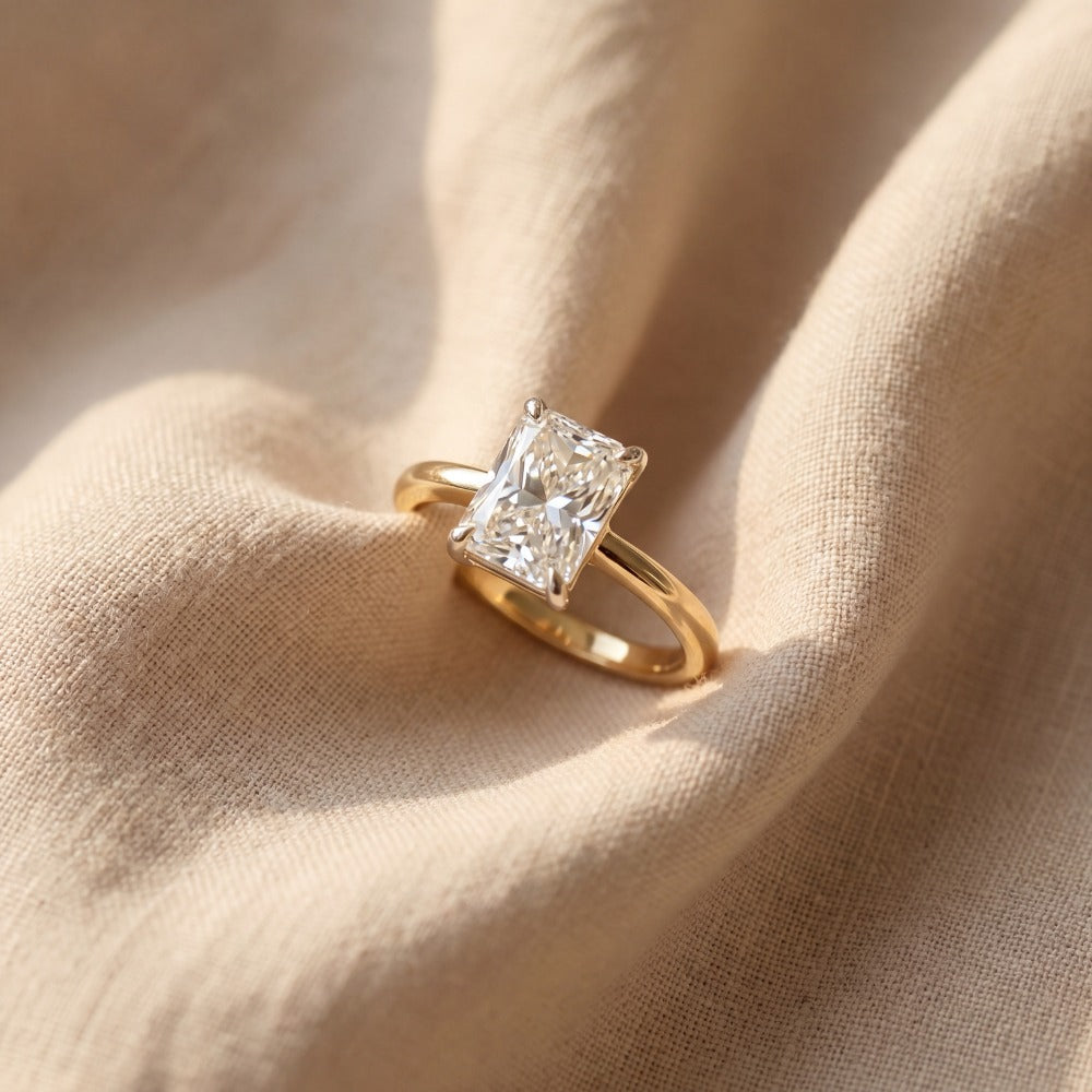 radiant cut engagement ring yellow gold band