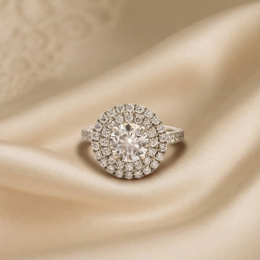 round cut double diamond halo ring on ladies hand platinum