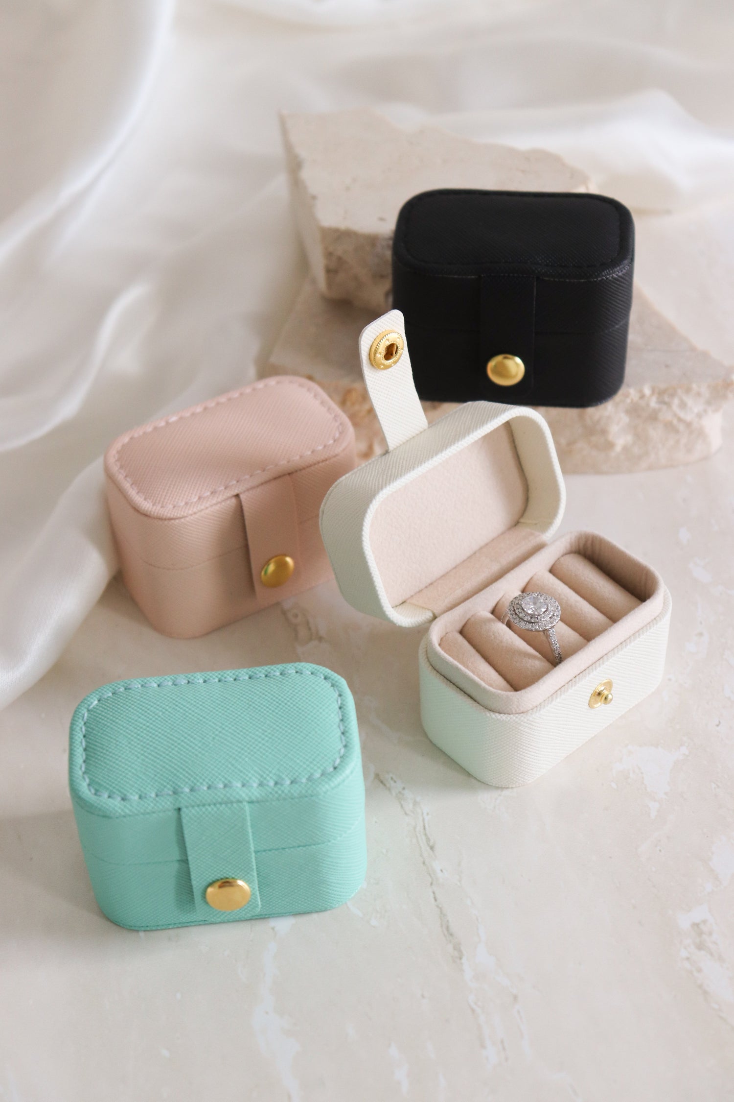 selection of coloured ring boxes