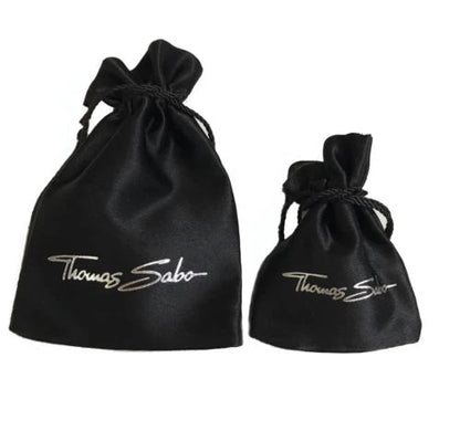 Two black drawstring bags with 'Thomas Sabo' branding on a white background